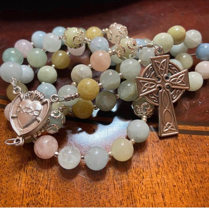 This handcrafted Colorful Morganite rosary has been made with care and detail, producing a traditional Catholic 5 decade format