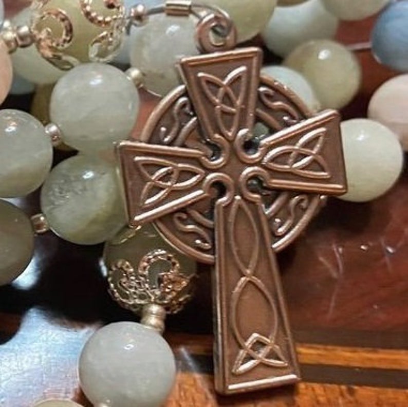 This handcrafted Colorful Morganite rosary has been made with care and detail, producing a traditional Catholic 5 decade format