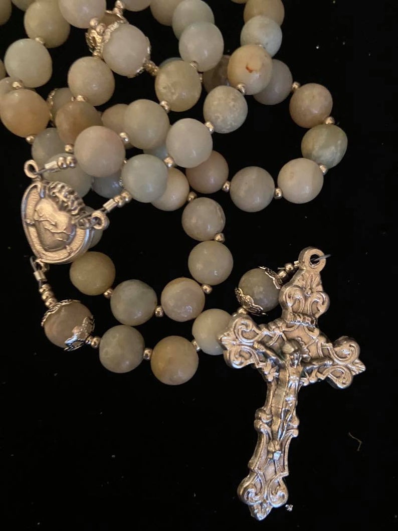 This handcrafted Colorful Morganite rosary has been made with care and detail, producing a traditional Catholic 5 decade format