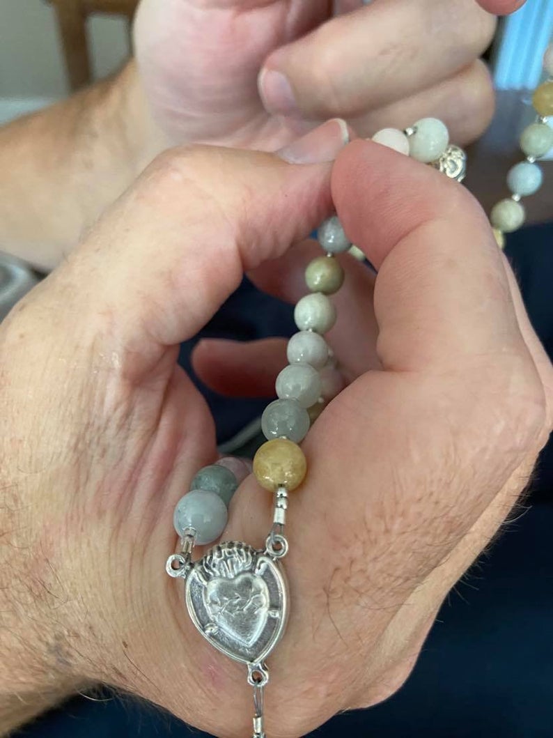 This handcrafted Colorful Morganite rosary has been made with care and detail, producing a traditional Catholic 5 decade format